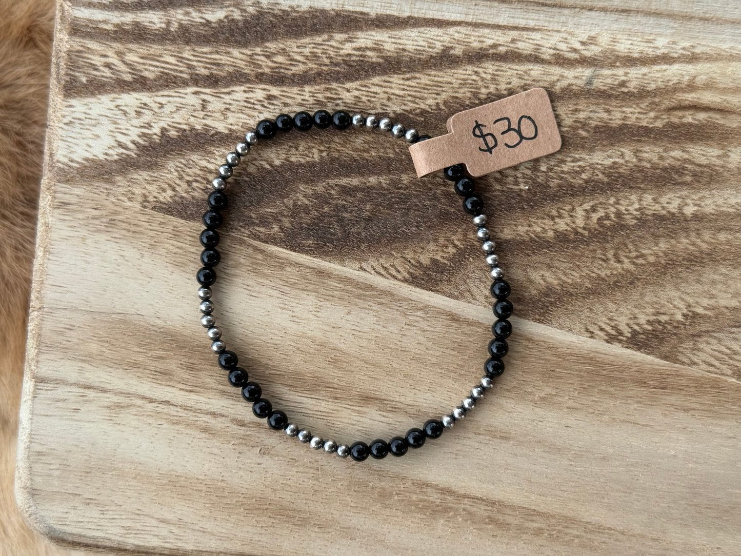 4mm black onyx and 4mm sterling silver pearls (stretchy)