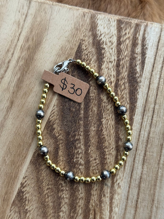 6mm sterling silver pearls and gold filled beads (clasp)