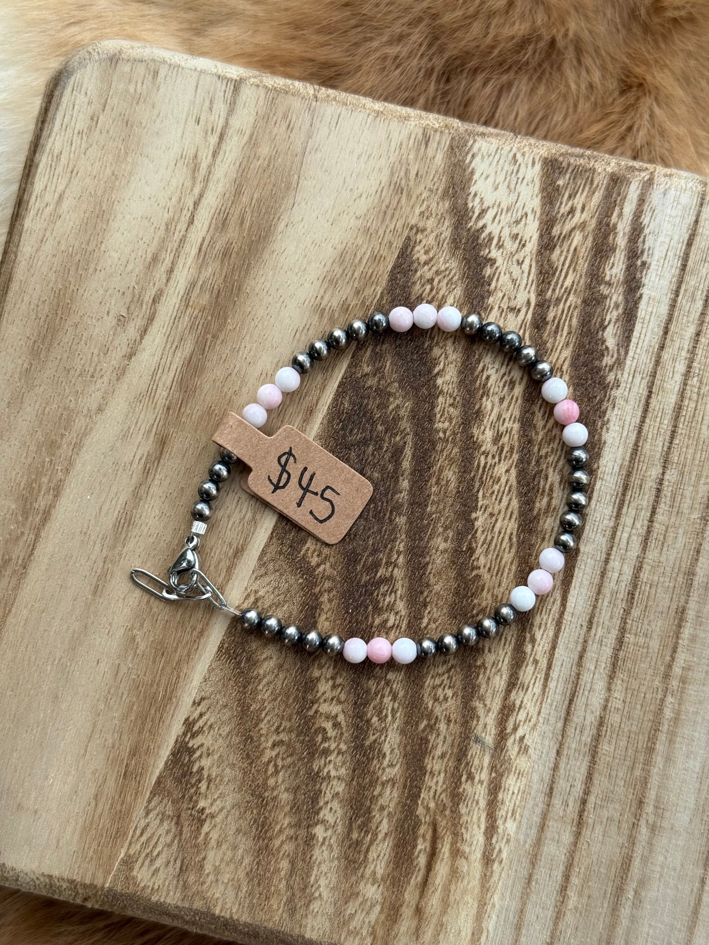 Pink conch beads and 4mm sterling silver pearls (clasp)