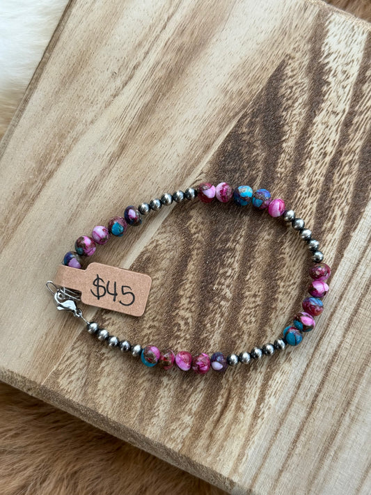 Purple dahlia and 4mm sterling silver pearls (clasp)